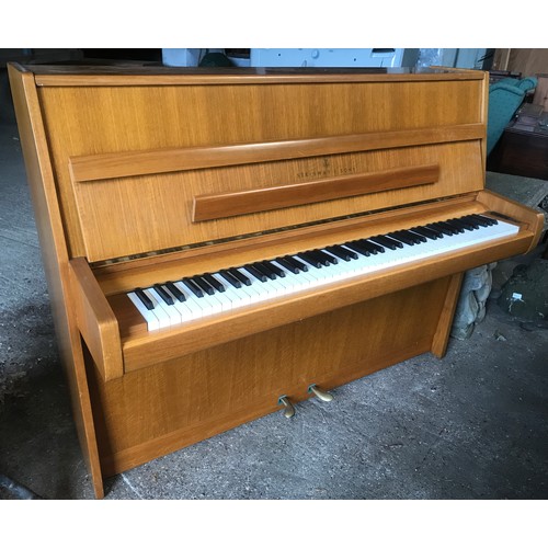 790 - A Steinway and Sons upright piano 146 w x 59 d x 114cm h and a piano stool and contents.