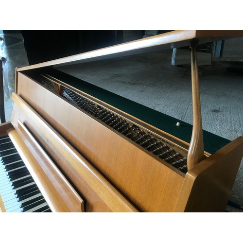 790 - A Steinway and Sons upright piano 146 w x 59 d x 114cm h and a piano stool and contents.