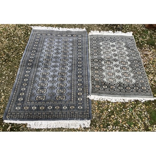 515 - Two grey patterned rugs 160 l x 97cm w and 120 x 80cm.