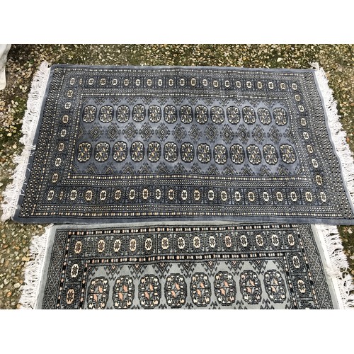 515 - Two grey patterned rugs 160 l x 97cm w and 120 x 80cm.