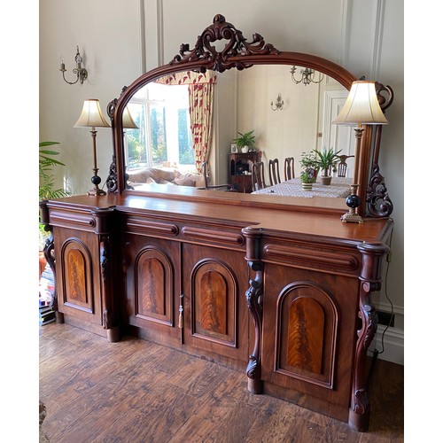 1153 - A good quality Victorian flame mahogany four door mirror backed sideboard with cellerette to interio... 