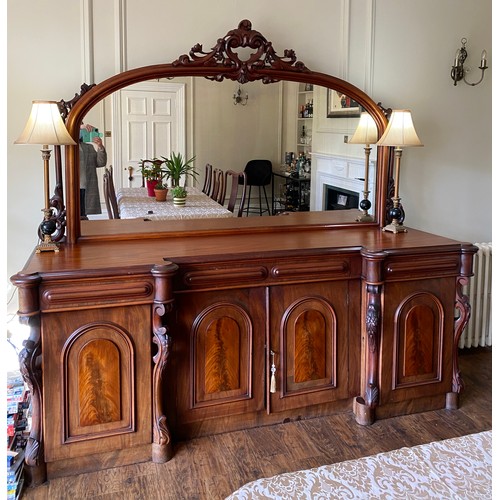 1153 - A good quality Victorian flame mahogany four door mirror backed sideboard with cellerette to interio... 