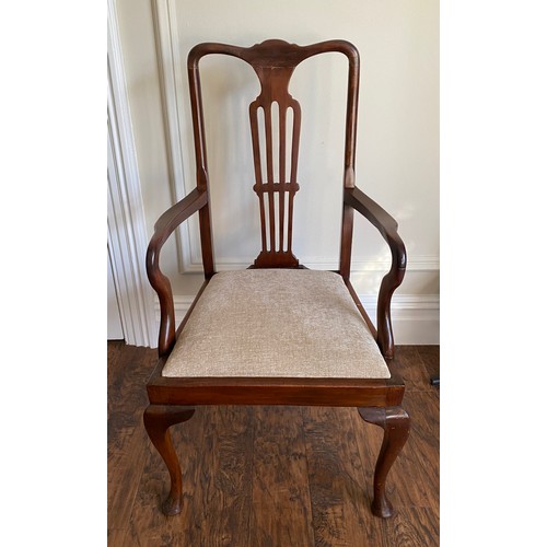 1152 - Ten mahogany dining chairs including 2 carvers with drop in seats and cabriole legs to front.