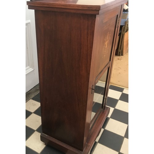 1130A - An Edwardian mahogany inlaid music cabinet. 55 w x 34 d x 105 h.