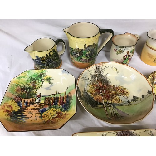 103 - Royal Doulton collection of 18 pieces, jugs, bowls, side plates and trays, cottage scenes, country g... 