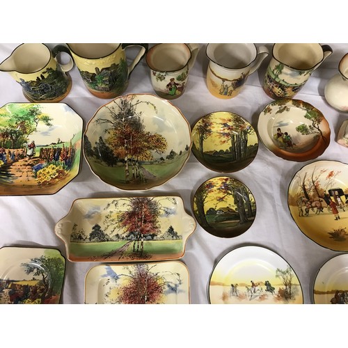 103 - Royal Doulton collection of 18 pieces, jugs, bowls, side plates and trays, cottage scenes, country g... 