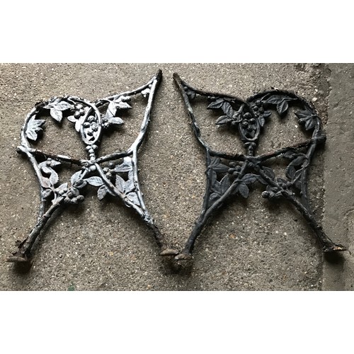 1267 - Pair of cast iron bench ends with grapevine decoration 57cm d.