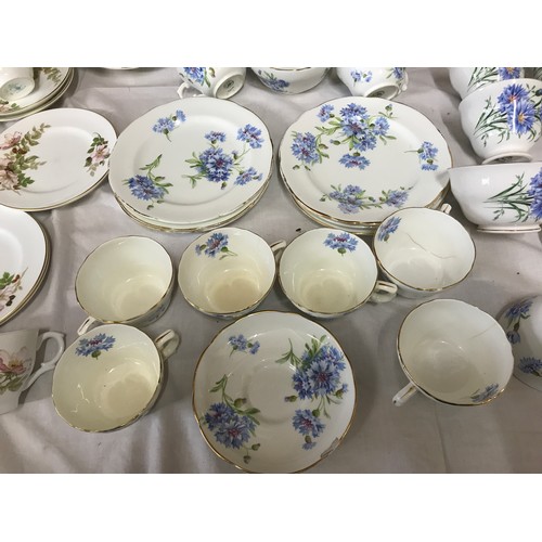 100 - Three assorted part tea sets, Crown Staffordshire pink floral, cups, saucers, side plates 18 pieces.... 