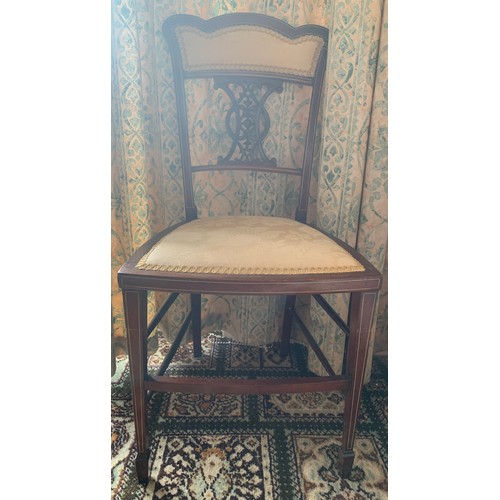 1153A - A mahogany and inlaid single chair.