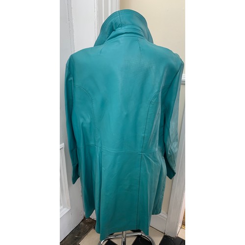 467 - A 1970’s turquoise leather ladies jacket made from Nappa leather, maker unknown. Size 64cm from armp... 