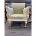 Painted and gilt Regency upholstered armchair.