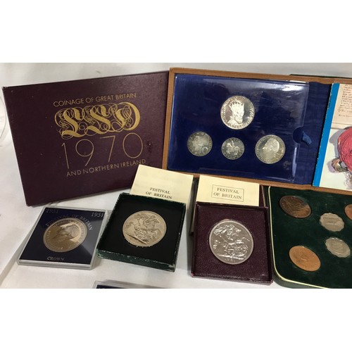 402 - A collection of coins to include Royal Mint 1970 coinage of GB and NI, Anniversary proof set Vienna ... 