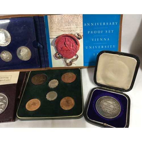 402 - A collection of coins to include Royal Mint 1970 coinage of GB and NI, Anniversary proof set Vienna ... 