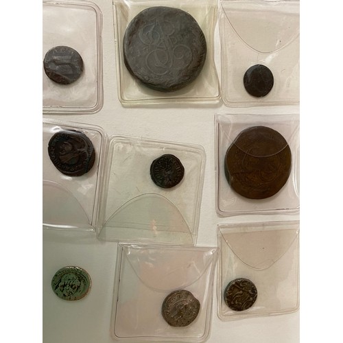 408 - Nine various coins to include Roman and possibly Russian, Middle East.