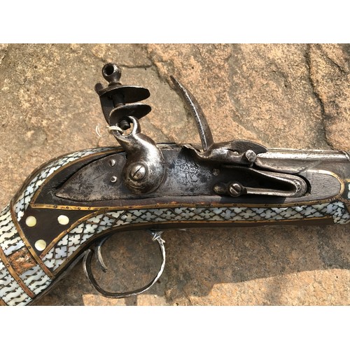 790 - Northwest Frontier Flintlock Musket, 43'' barrel, stock heavily inlaid with brass and mother of pear... 