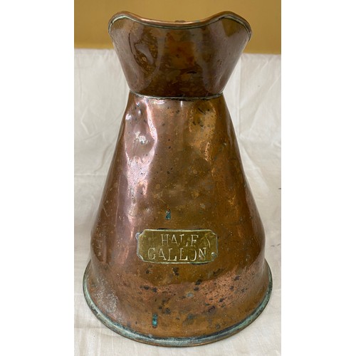 625 - Three copper jugs with brass plates denoting size i.e. Quart, Half Gallon and One Gallon. Tallest 29... 