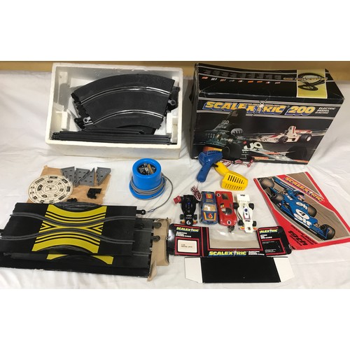 661 - Scalextric 200 Model Racing set, four cars, track, power pack, controllers, boxed.