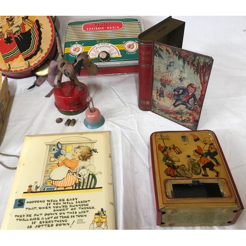 665 - A tinplate toys collection to include: German U.S. Zone Happy clown, Chad Valley Treasure Island boo... 