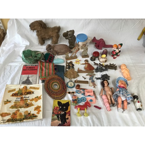 666 - Plastic and wooden toy selection, plush fur pink rabbit and a dog, plastic small dolls, wooden cut o... 