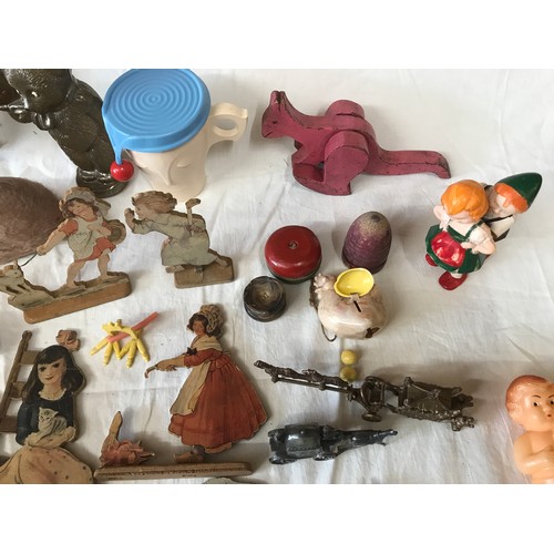 666 - Plastic and wooden toy selection, plush fur pink rabbit and a dog, plastic small dolls, wooden cut o... 