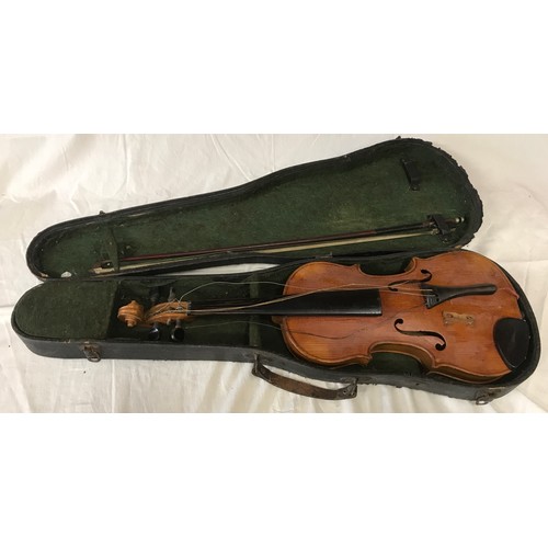 765 - A Stradivarius copy violin with bow and case, label to interior, 56 cm l.