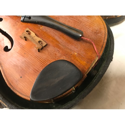 765 - A Stradivarius copy violin with bow and case, label to interior, 56 cm l.