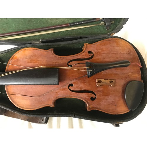 765 - A Stradivarius copy violin with bow and case, label to interior, 56 cm l.