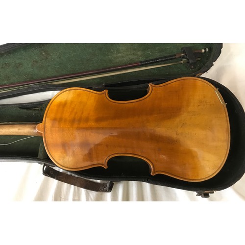 765 - A Stradivarius copy violin with bow and case, label to interior, 56 cm l.