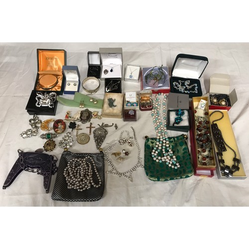 329 - A selection of costume jewellery to include necklaces, bangles, gold plate and silver plate, earring... 