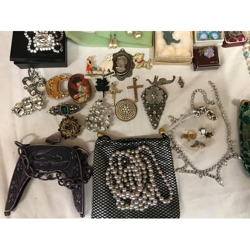 329 - A selection of costume jewellery to include necklaces, bangles, gold plate and silver plate, earring... 