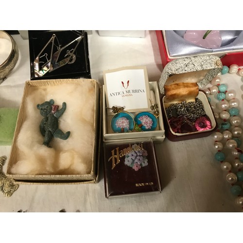 329 - A selection of costume jewellery to include necklaces, bangles, gold plate and silver plate, earring... 