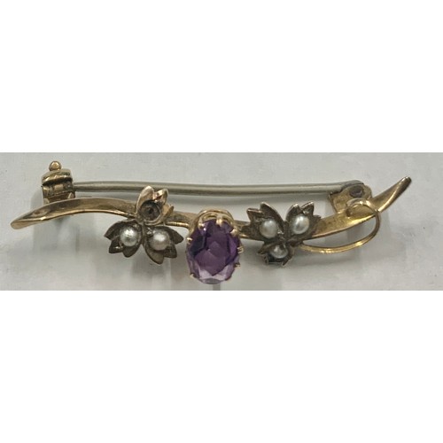 337 - A 9ct gold and amethyst seed pearl brooch. Weight 1.5gm.