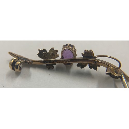 337 - A 9ct gold and amethyst seed pearl brooch. Weight 1.5gm.