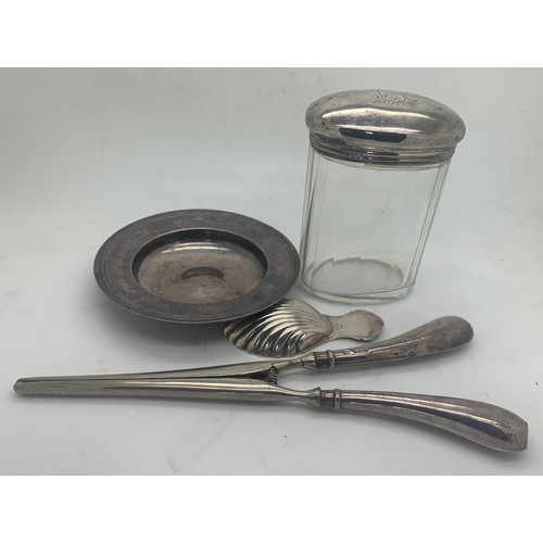 531 - Silver to include caddy spoon Birmingham 1964, silver handled glove stretchers, silver topped glass ... 