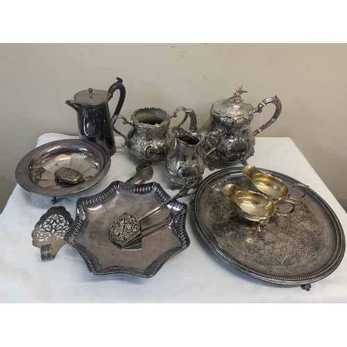 520 - A quantity of silver plated items to include tea service, jugs etc.