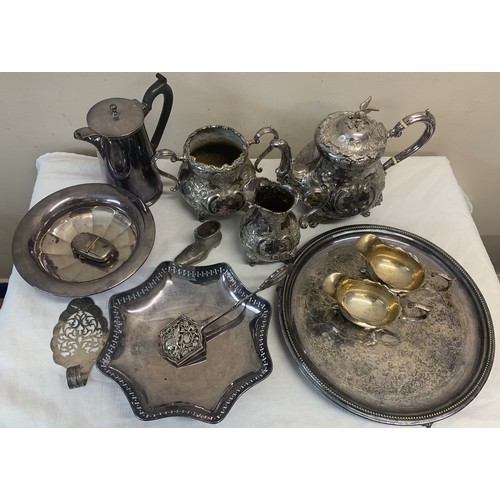 520 - A quantity of silver plated items to include tea service, jugs etc.