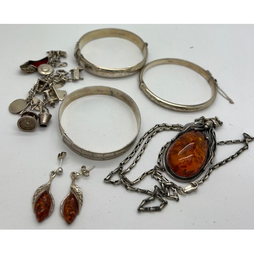 345 - Jewellery to include amber pendant and earrings marked .925, 2 silver hallmarked bangles, 1 unmarked... 