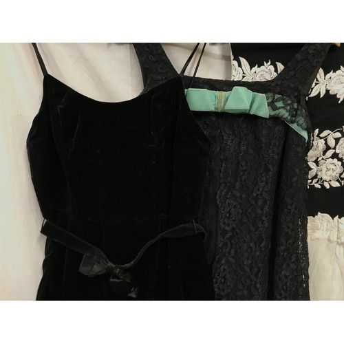 468 - A selection of vintage black dresses to include a Radley black velvet long dress size 16, long black... 