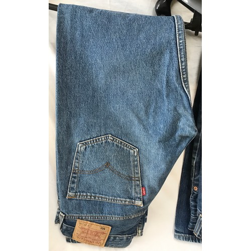 476 - A selection of four vintage Levi's 501 denim jeans. sizes from right to left 29 x 32, 34 x 30, 29 x ... 