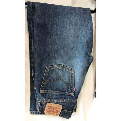 476 - A selection of four vintage Levi's 501 denim jeans. sizes from right to left 29 x 32, 34 x 30, 29 x ... 