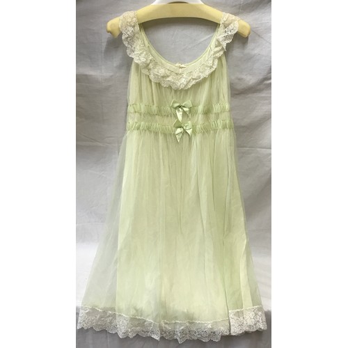 480 - A selection of 1960's vintage clothing to include a light green dressing gown and matching slip by S... 