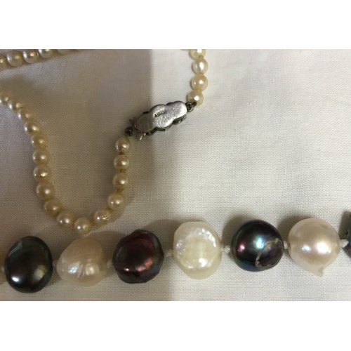 346 - A boxed pearl necklace with silver clasp together with another pearl necklace with silver clasp, a n... 