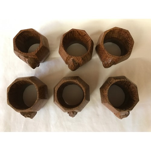 782 - Six Robert Thompson 'Mouseman' napkin rings. Octagonal form. 4.5cm.