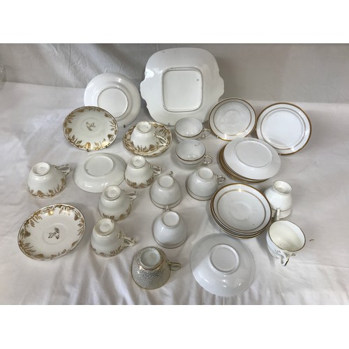 21 - A selection of 19thC gold and white ceramics to include a Worcester Barr & Barr Flight 1807-1815 cup... 