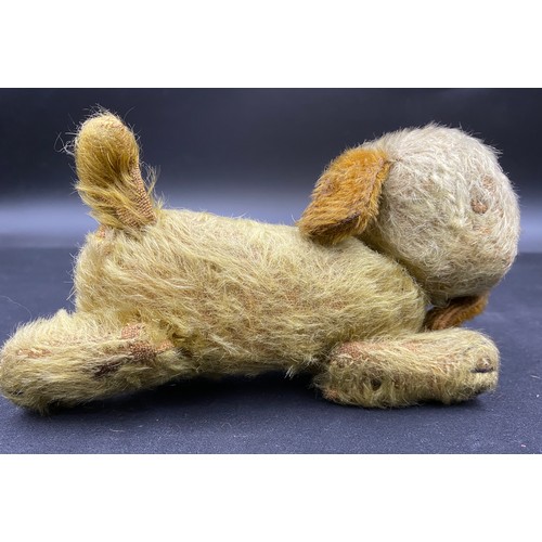 667 - Vintage toys to include : a blonde faux fur straw filled dog with glass eyes, embroidered nose, felt... 