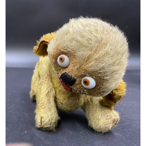 667 - Vintage toys to include : a blonde faux fur straw filled dog with glass eyes, embroidered nose, felt... 