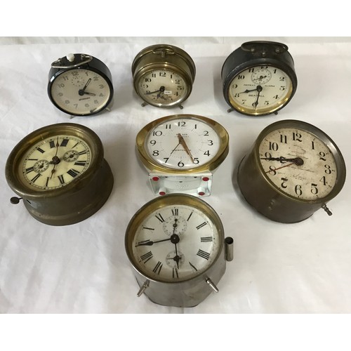 806 - Selection of 7 alarm clocks, not tested, some need obvious restoration. Tallest 12.5cms.