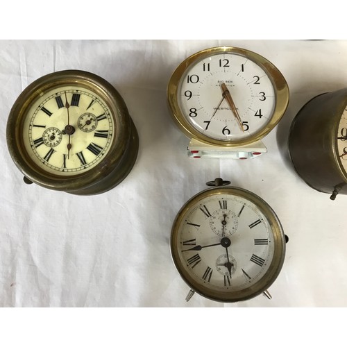 806 - Selection of 7 alarm clocks, not tested, some need obvious restoration. Tallest 12.5cms.