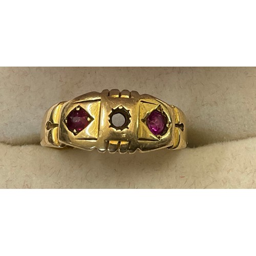 348 - Eighteen carat gold ring set with 2 rubies. Weight 2.8gm.