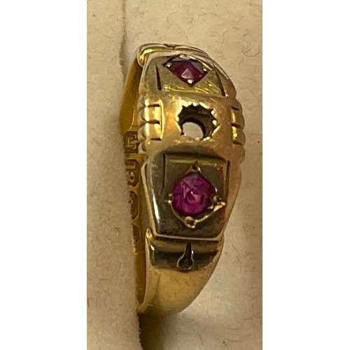 348 - Eighteen carat gold ring set with 2 rubies. Weight 2.8gm.